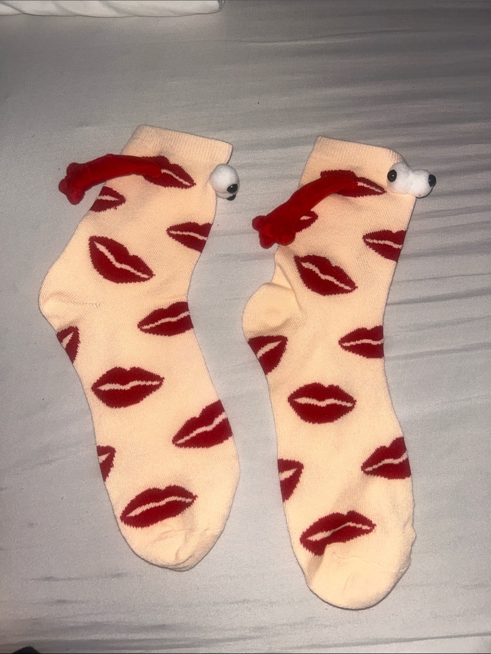 Peach Socks with Red Lip Print and Pom Accent